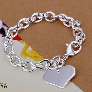 - The Linked Heart Charm bracelet with lobster closure
